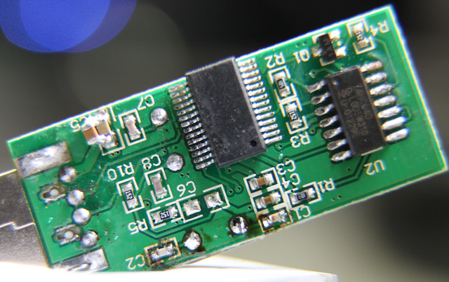 Photo of component side of SIM card reader, after rework to add capacitors