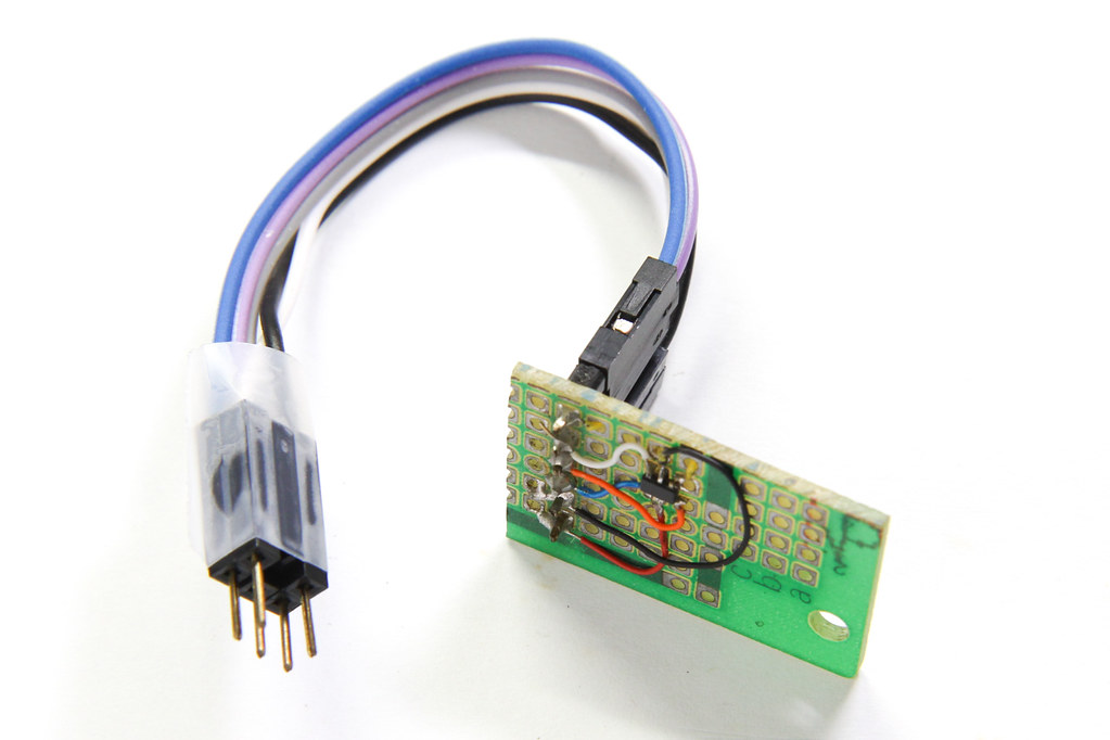ATtiny10 board with attached AVR ISP programming connector