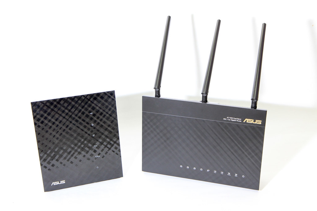 the Asus N56U and AC68U routers, side by side