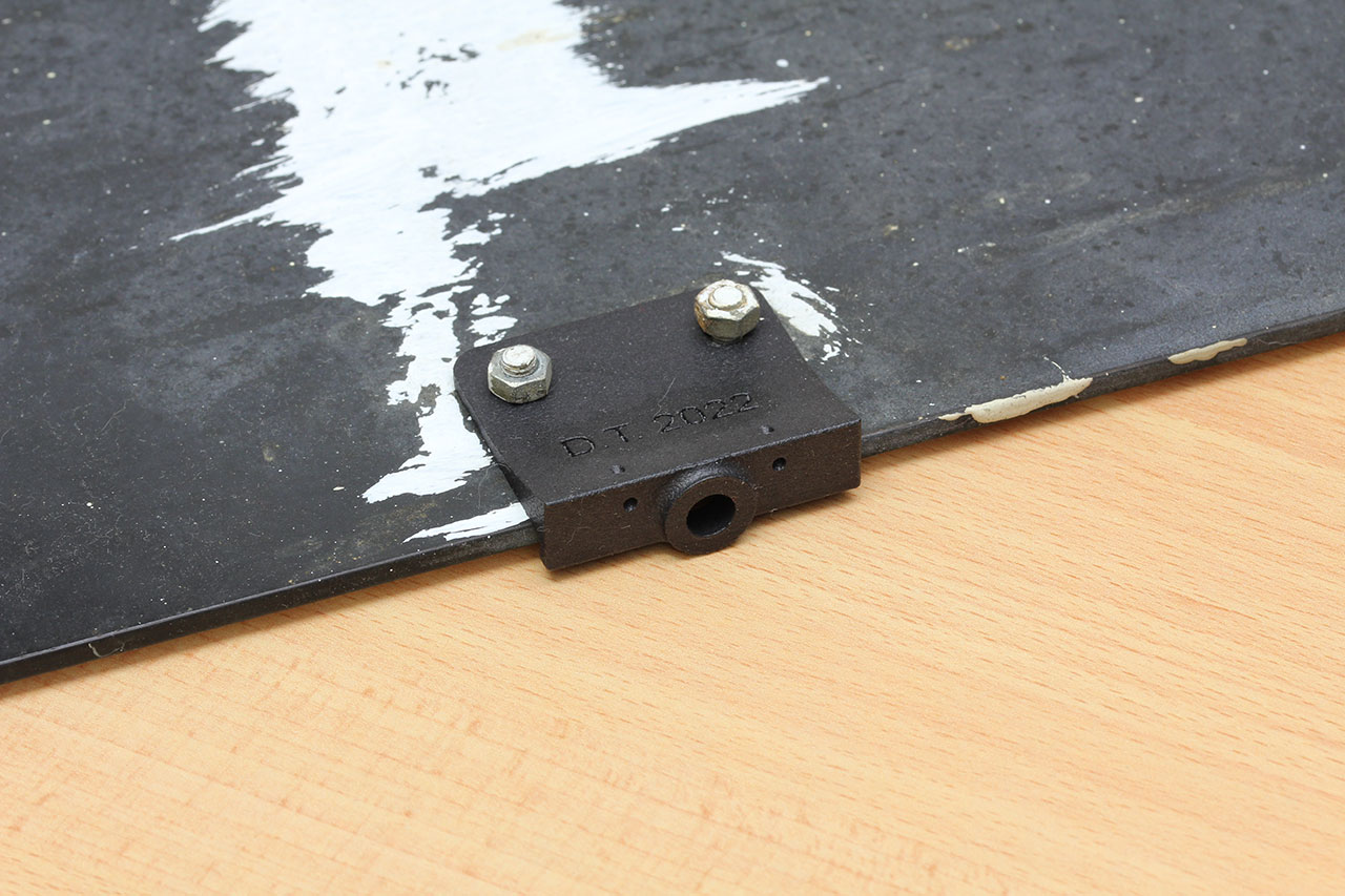 photo of the 3D printed bracket fitted onto the back of the mirror glass