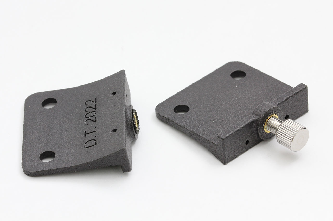 photo of the 3D printed brackets, one facing up and the other, down
